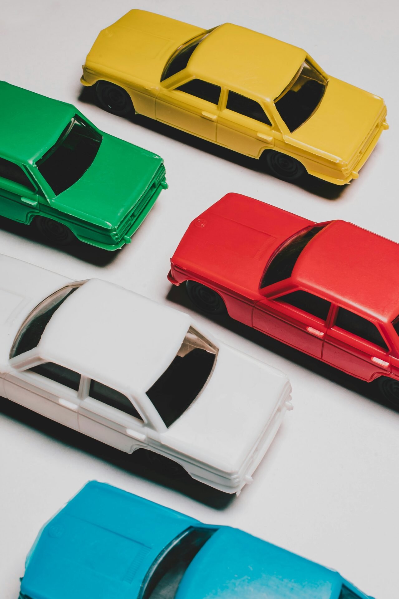 a group of toy cars sitting on top of a table