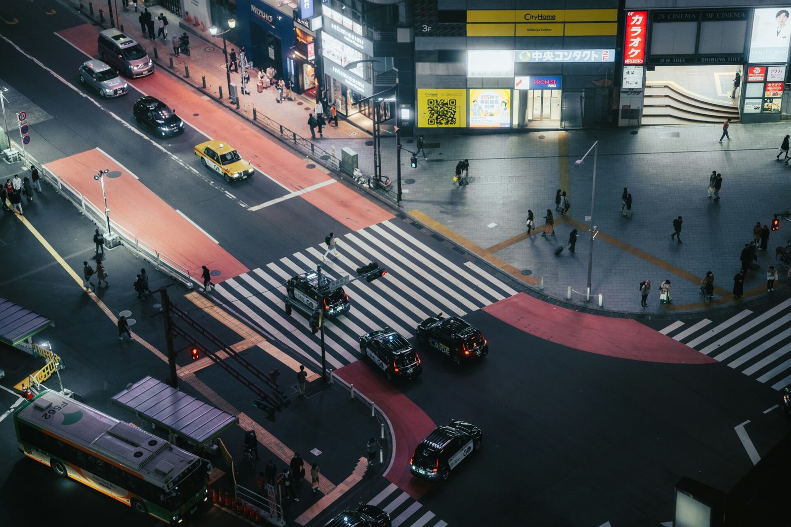 an aerial view of a city street at night